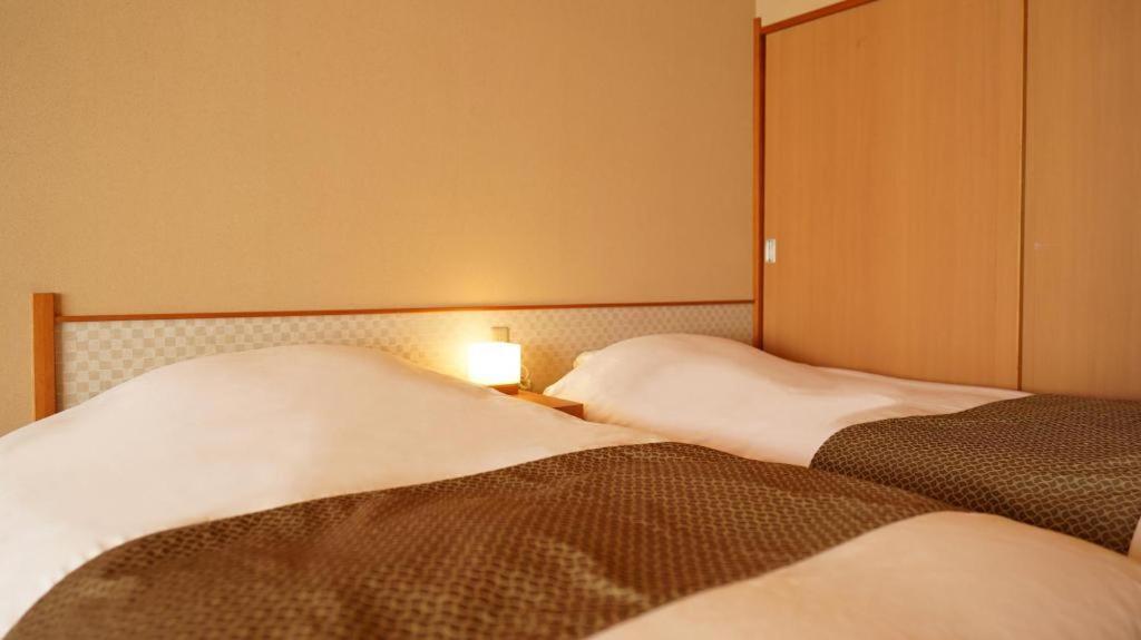 Tsukino Sumika Atami Juraku Hotel Экстерьер фото