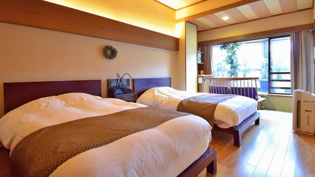 Tsukino Sumika Atami Juraku Hotel Экстерьер фото