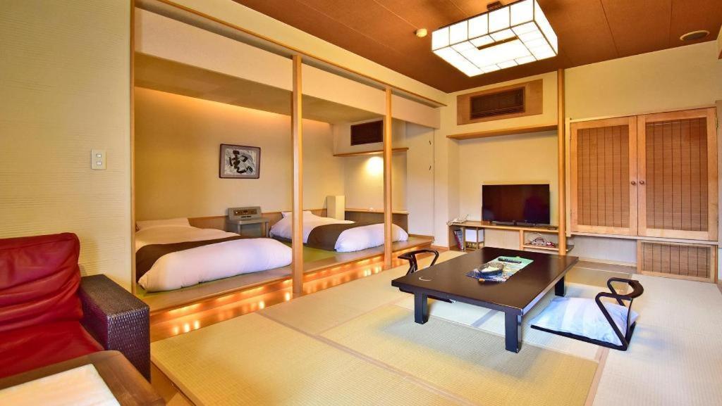 Tsukino Sumika Atami Juraku Hotel Экстерьер фото